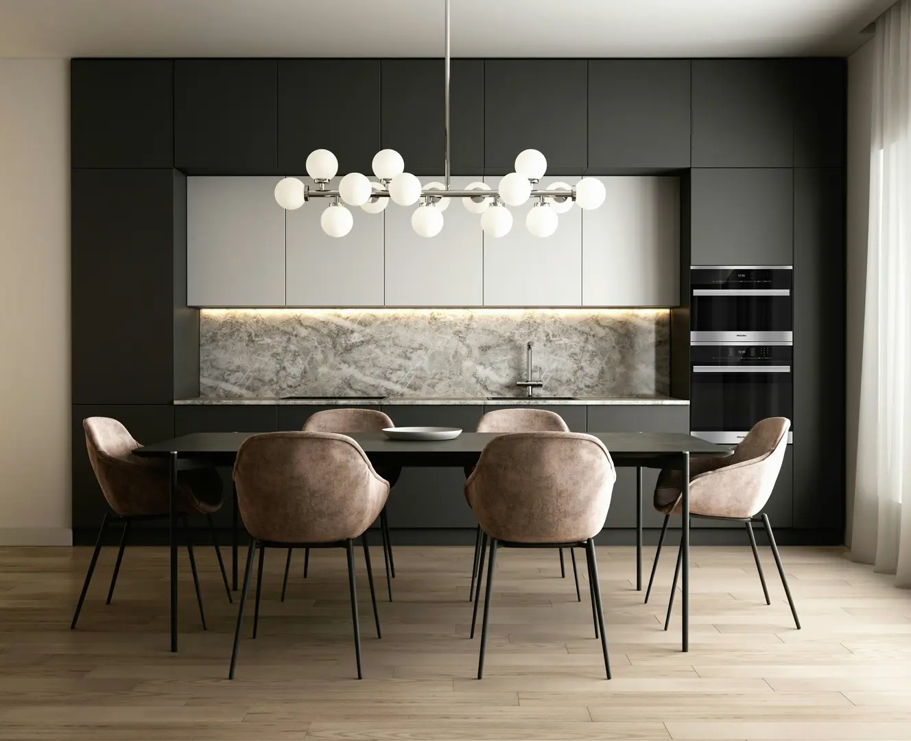 Offene Design-Küche mit Kochinsel in Waldgrün